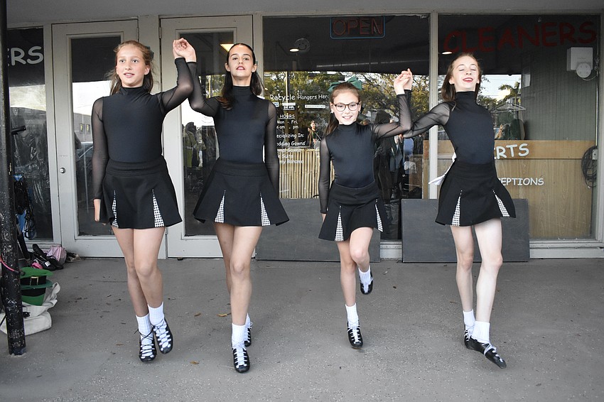 Ansley Elwell, 13, Shai Mitzafon, 14, Olivia Bewley, 10 and Talula Perritt, 13, offer a dance performance. with Kavanagh Porter Academy. The Sarasota branch of the Irish dance school was celebrating its first St. Patrick's Day.