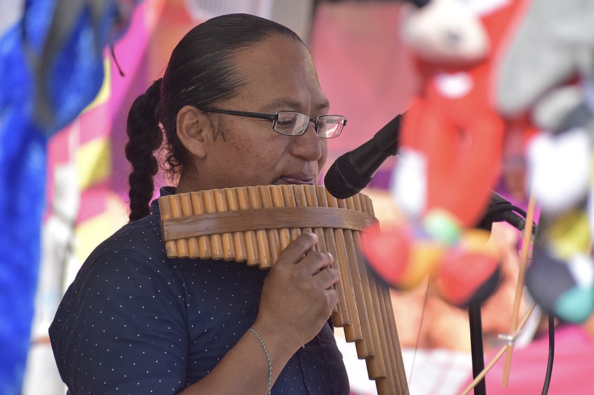 Inti Tambaco of Native Winds plays the pan flute.