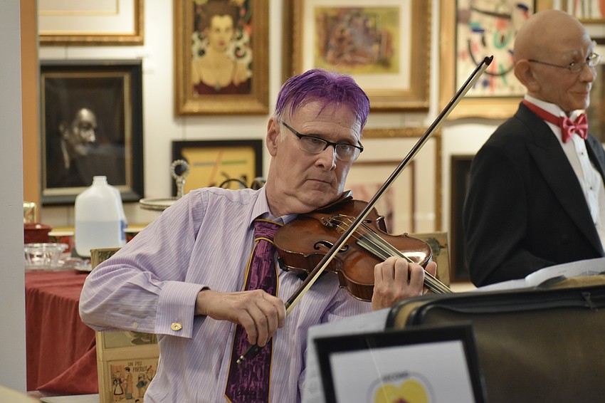 Paul Sykes plays the violin.