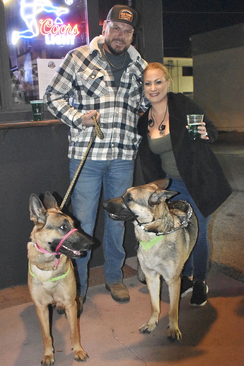 Justin McFarling and Rachael Decoursey brought their German Shepherds Coda and Luca.