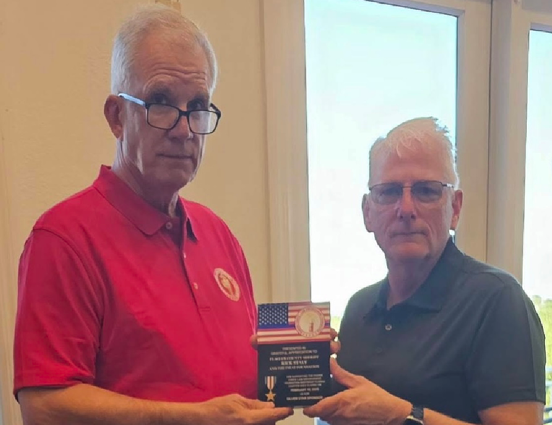 Jerry DiMenna presenting thank you plaque to Breakfast Sponsor FSEAT Foundation. Accepting the plaque for Sheriff Rick Staly is FCSO Chief of Staff Mark Strobridge. Courtesy photo