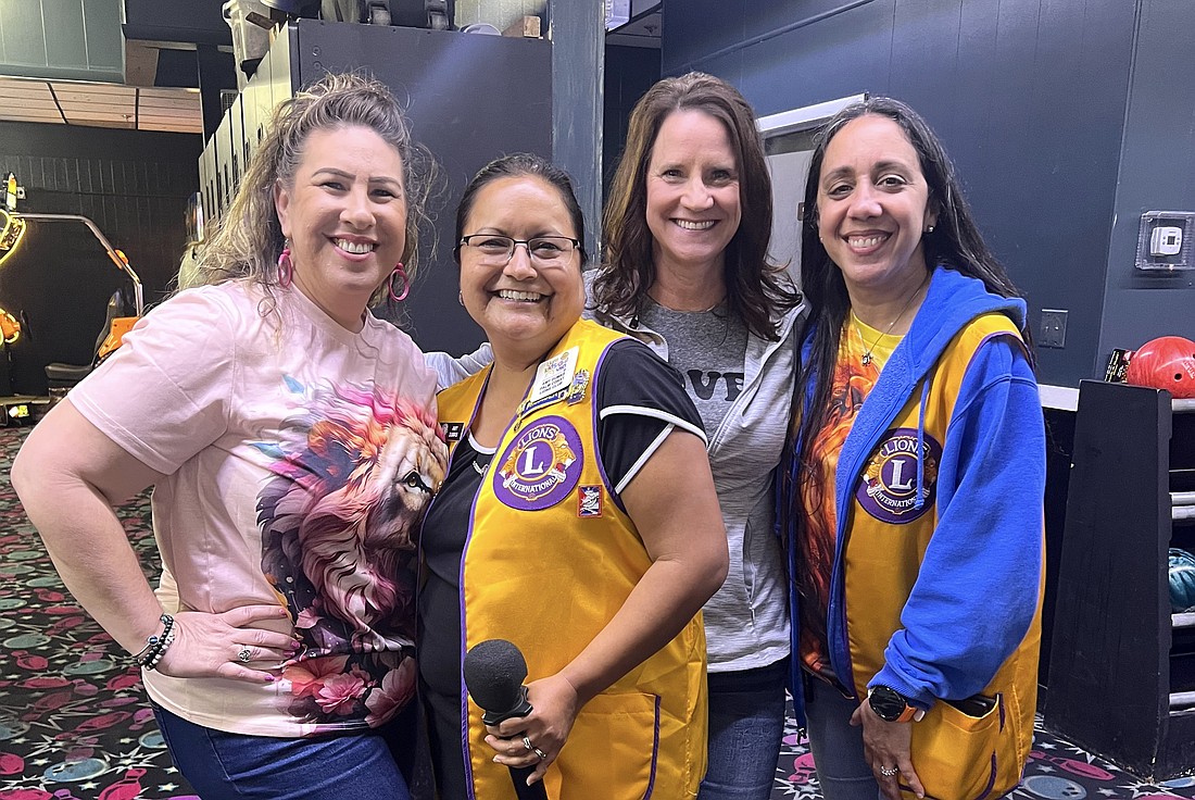 Palm Coast Lions Club members Shara Brodsky, Amy Dumas, Brenda Walter and Nina Guiglotto at the bowling fundraiser. Courtesy photo