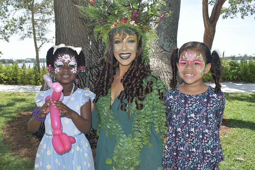 Zuri Wilkins, 4, Harris King as Mother Nature, and Adara Goita, 4