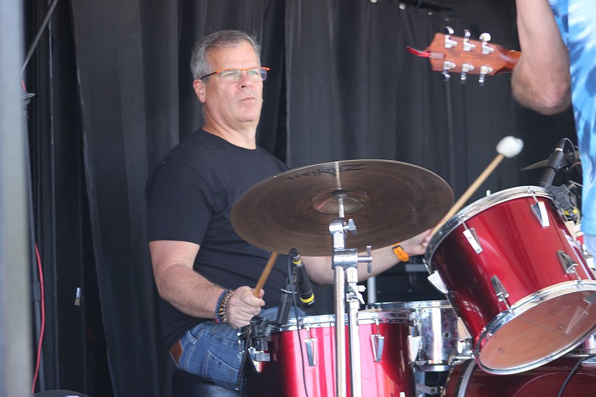 Roberto Villanueva played the drums with the Tom Dodge and Friends group at Dag Fest In Myakka City.