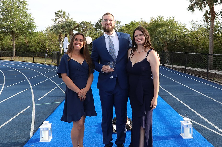 ODA teachers Cayse Imhoff (1st grade), Greg Sheridan (4th & 5th) and Bonnie Schneider (1st grade assistant) attend the Banyan Ball.