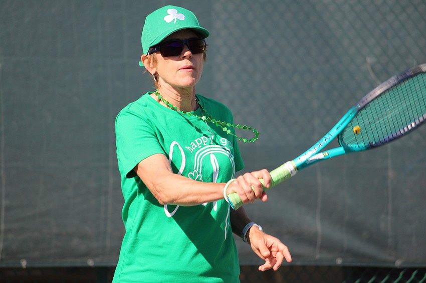 Ellen Zimmerman serves.