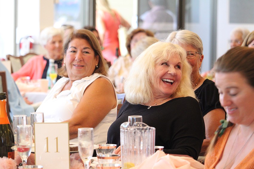 Audience member Linda Fortino smiles at model Linda DiOrio.