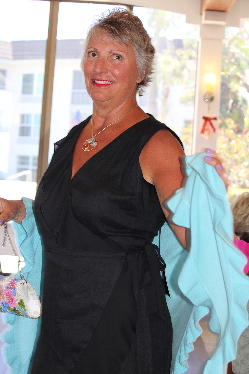 Margarita Lenk shows off her shawl.