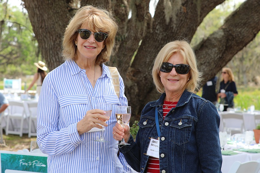Ann Jackson and Janet McIntyre toast to Mote Marine.