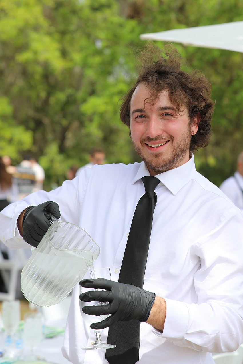 Jake Paske from Mattison's makes sure everyone stays hydrated at Mote's Farm to Fillet.