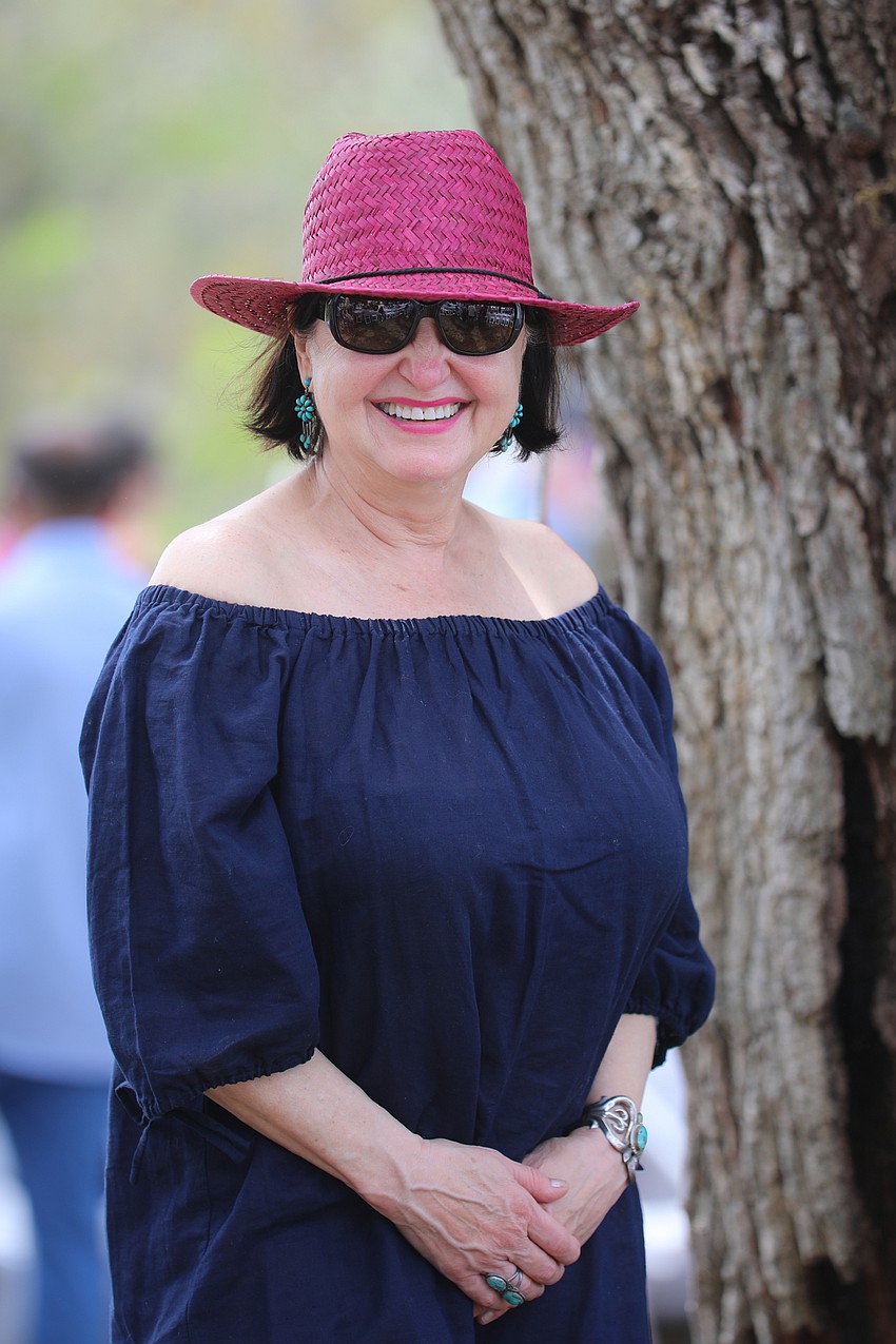Texan and volunteer Sue Lehrer leads tours around the Mote Aquaculture Research Park after the luncheon.