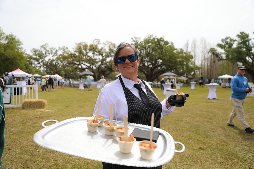 Tasha Chemlen from Mattison's serves shrimp and grits with a tad of spice.