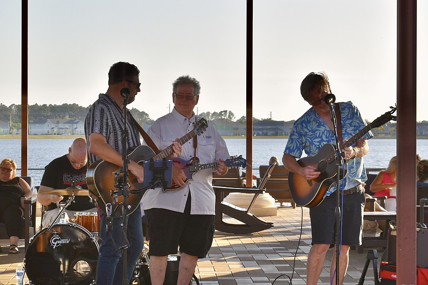 Sarasota band Prodigal Sons plays a Grateful Dead tune for the crowd in the plaza.