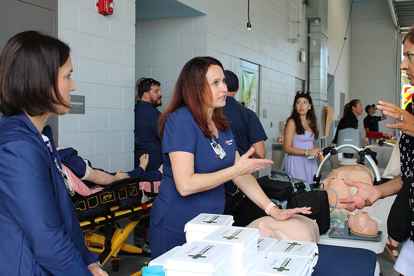 Dana Szalbirak, Sarasota Doctors Hospital emergency services manager, offers CPR advise.