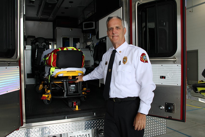 Chief Paul Dezzi offers a tour inside the new ambulance.