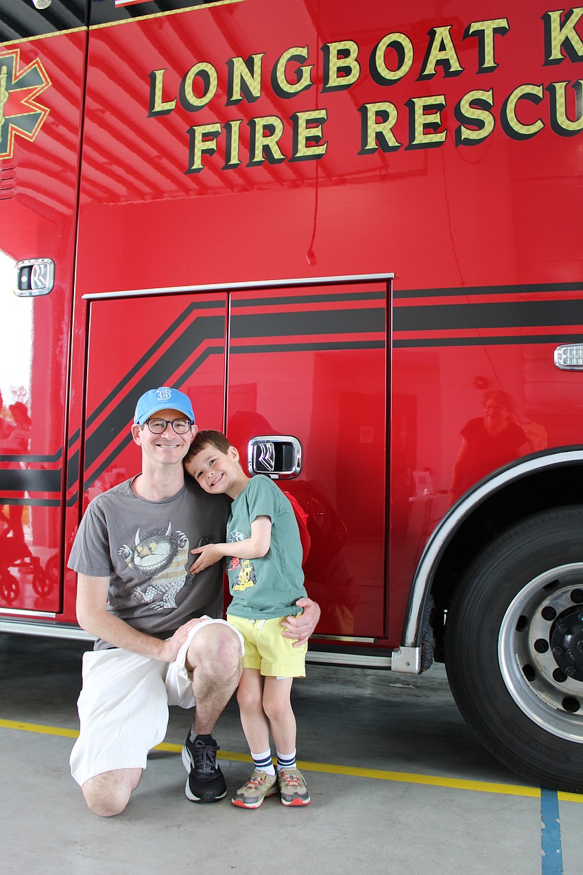 Michael Himelfarb and Benji, 5, spend a day with Longboat Key-based family at the open house. Benji's favorite part was seeing the new ambulance.