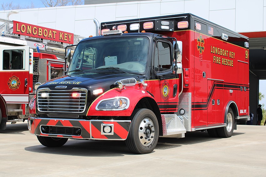 The new ambulance lights up outside Station 92.