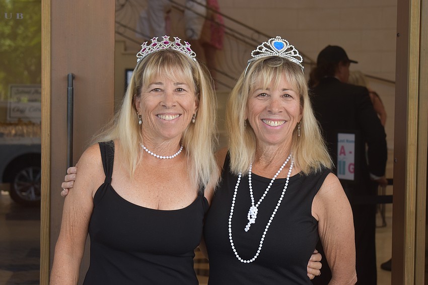 Stacey Clevenger, a volunteer of 10 years and Stephanie Little, a volunteer of 13 years, help make Divas and Dogs successful.