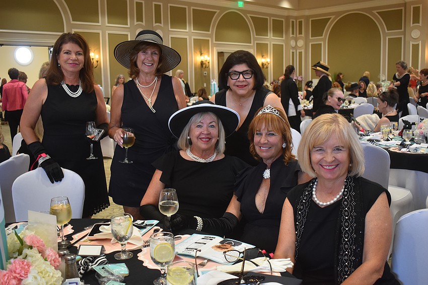 Back row, Debbie Urban, Ellen Moore, and Kathy Hunt, attend Divas and Dogs along with, front row, Susan Hendrix, Sue Tankersley and Jan Martin.