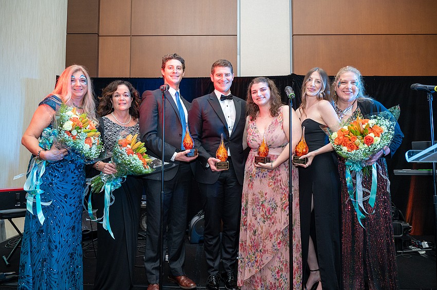 Diana Napoliello, Laura Magnusson, Michael, Joe, Annie, and Devin Sutherland and Gana Gilkey. The three co-chairs were honored with flowers and the Legacy Of Hope Award.