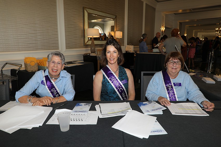 Margaret Breuer, Stacey M Frazier and Judy Wolff volunteer for the SPARCC Runway on March 28.