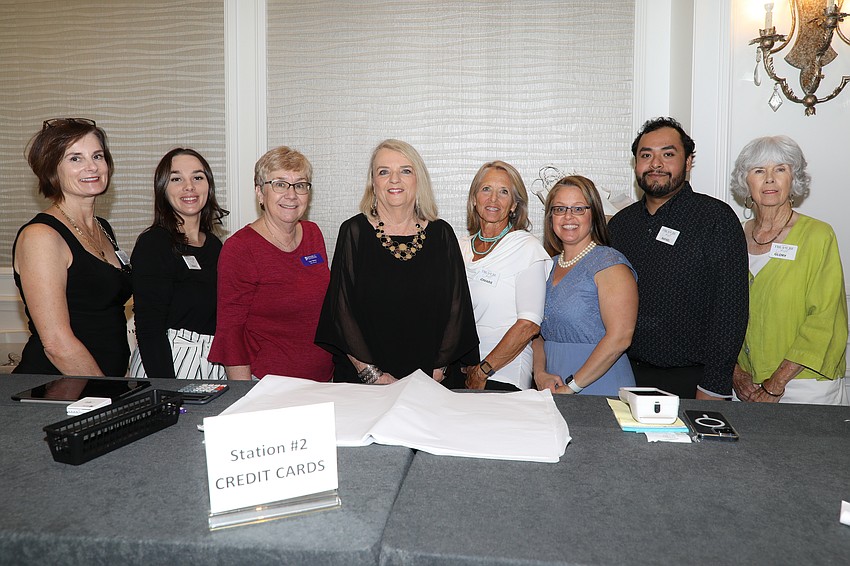 Kate Graham, Shayna Callaway, Lori Deitz, Nancy Raymond, Jo Marie Privitera, Melissa Smith, Raphael Diaz and Glory Slupe assist guests.