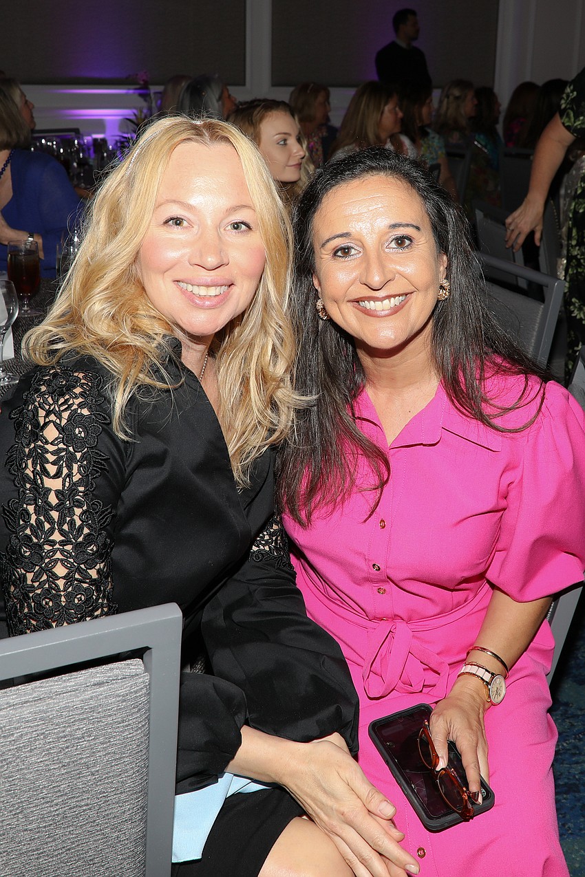 Olga Coronas and Jennifer Mitchell enjoy the SPARCC luncheon.