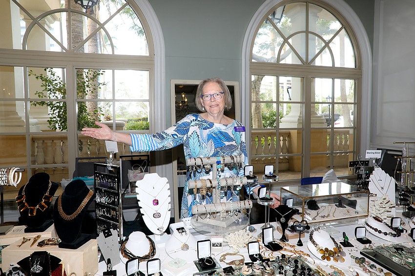 SPARCC Treasure Chest volunteer and Auxiliary Board member Kathy Finnerty cites organizing the jewelry as her favorite part of the annual fashion show.