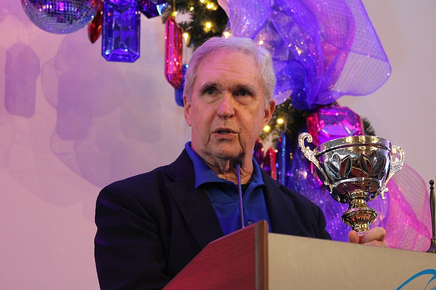 Frank Sulzman accepts the Bill Flinter Award.