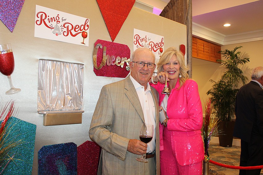 Carl Arentzen and Elaine Dabney take in their hard work coordinating this year's annual Friars dinner.