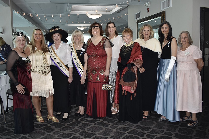 Members dressed in attire from across decades to celebrate the anniversary, including Mary Beth McLeod and Shawna Smith (1920s) Mary Lou McFate (circa 1920s) Diane Kingery Gentsch, Angela DeForest and Cynthia Flynn (1920s), Ronelle Ashby (1930s), Peggy Torgerson (1940s), State Registrar Jennifer Lawton Marks (1950s) and Clarissa Thomasson (1990s).