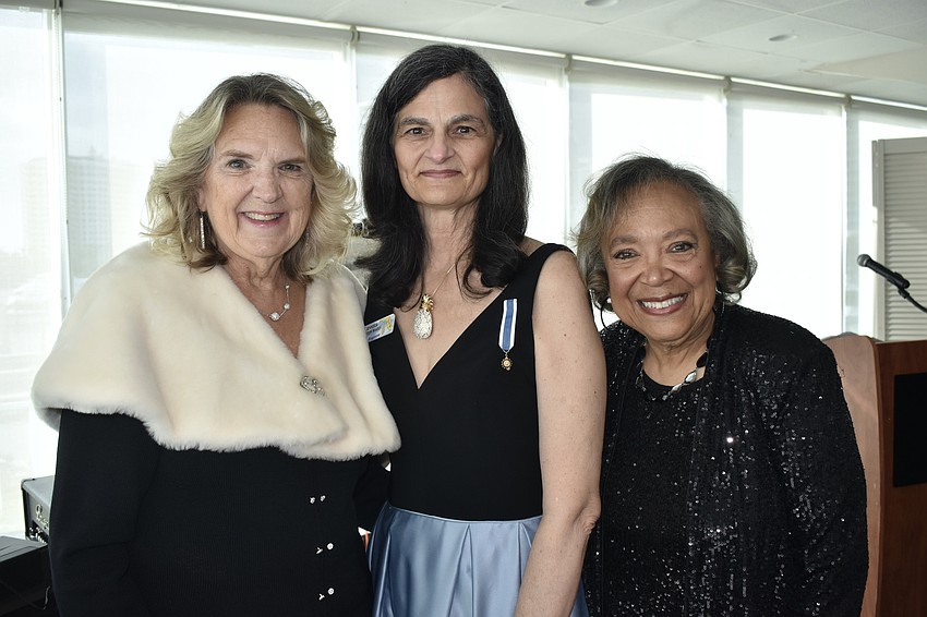 Peggy Torgerson and State Registrar Jennifer Lawton Marks worked with Vada Love, who joined the Sarasota chapter in August, to prove her geneology. Love noted it is difficult for African Americans to trace their ancestry to the Revolutionary War, and the process took five years. Her patriot is Achilles Morman of Kentucky, who aided the cause by giving supplies.