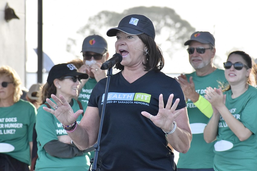 Flora Kirwin of HealthFit at Sarasota Memorial Hospital led the warmup session.