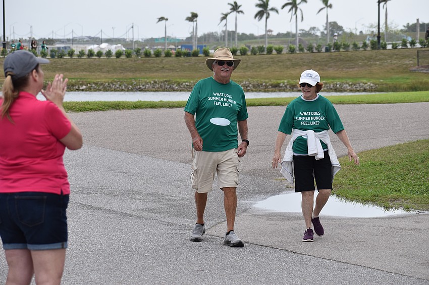 Norm and Melinda Sharrit complete the walk.