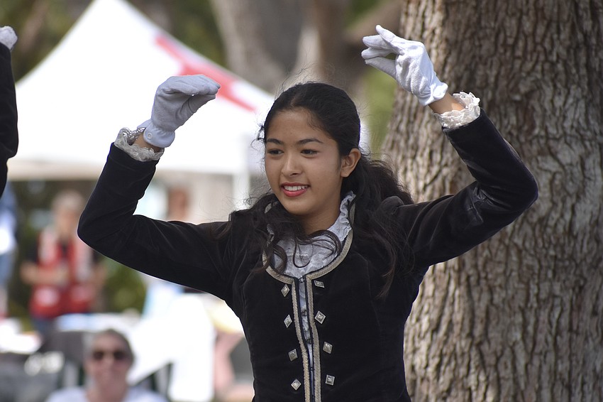 10th grader Zoey Silver of the Riverview High School Kiltie Band participates in a dance performance.