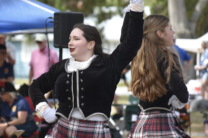 10th graders Rachel Leeper and Addie Ross of the Riverview High School Kiltie Band participates in a dance performance.