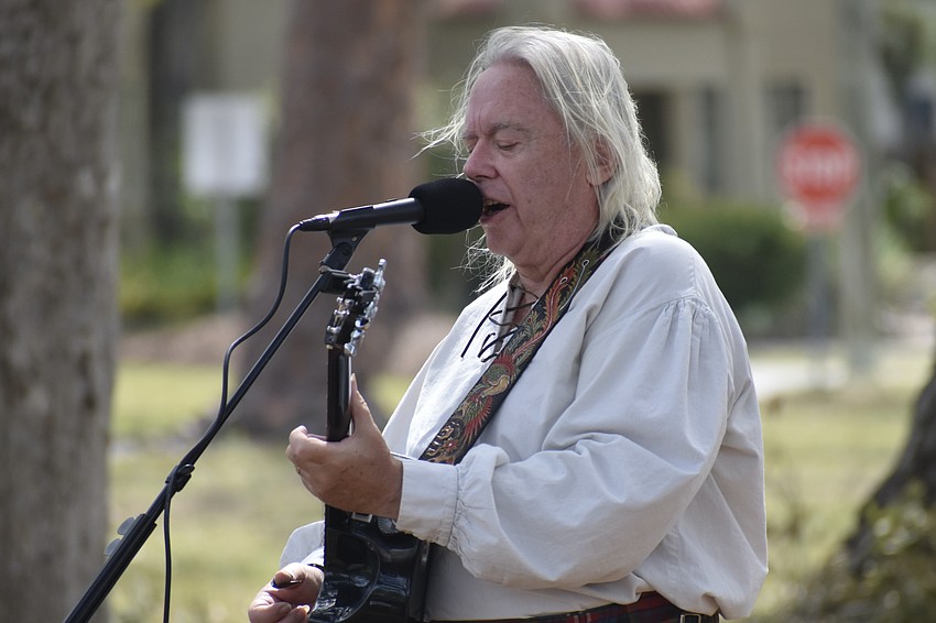 Bill Mullen, who is originally from Dundee, Scotland, offers a song performance.