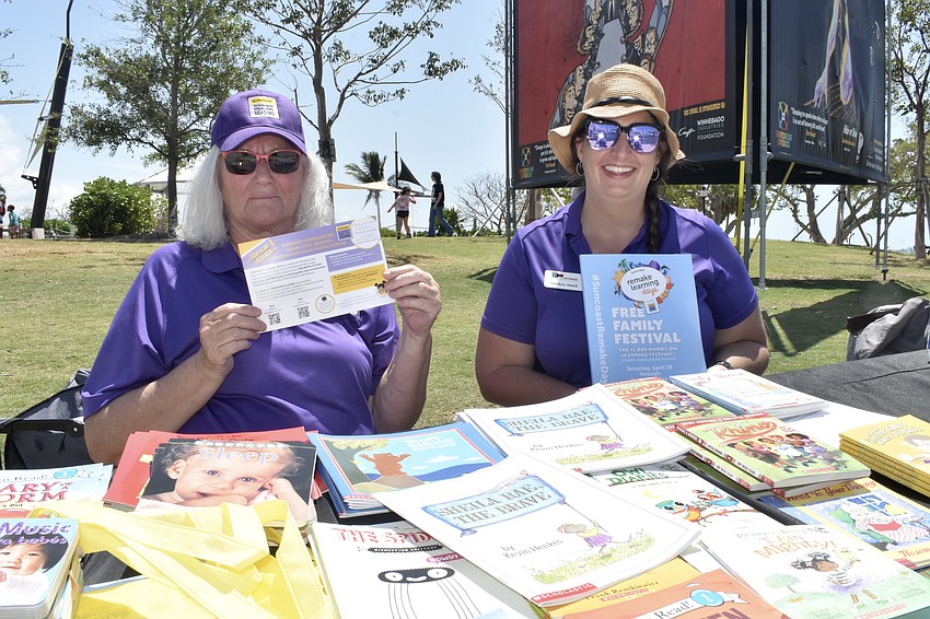 Marla Smith and Lyndsey Smith of the Suncoast Campaign for Grade Level Reading offered books, from their table at the event.