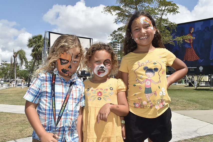 Dante Espin, 5, and his sisters Emilia Espin, 5, and Elda Espin, 7, all had their faces painted.