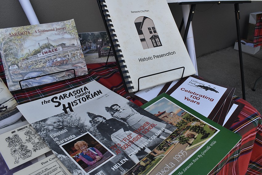 Historical materials collected by Linda Holland are on display, including a 1983 history magazine about Einstein's 1950 visit to Sarasota.