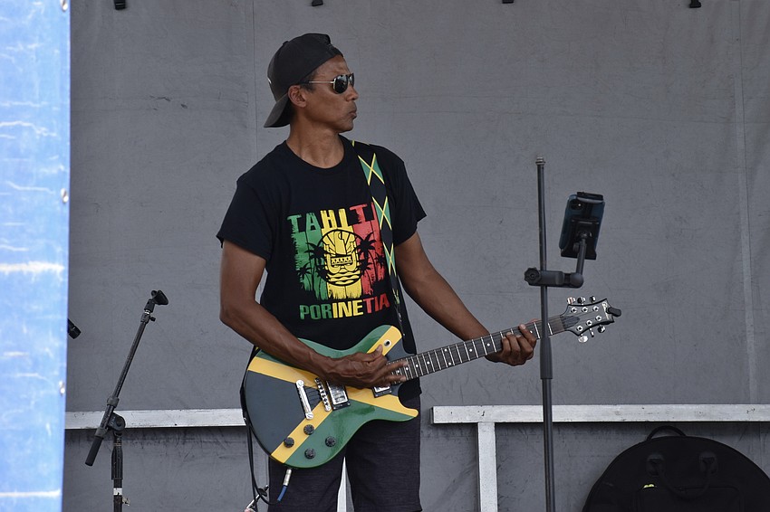 Paul Young performs with King Tappa.