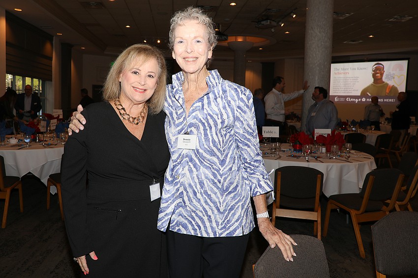 Tina Papa and Bunnie Gauspohl attend the third annual Giving Breakfast on March 27.