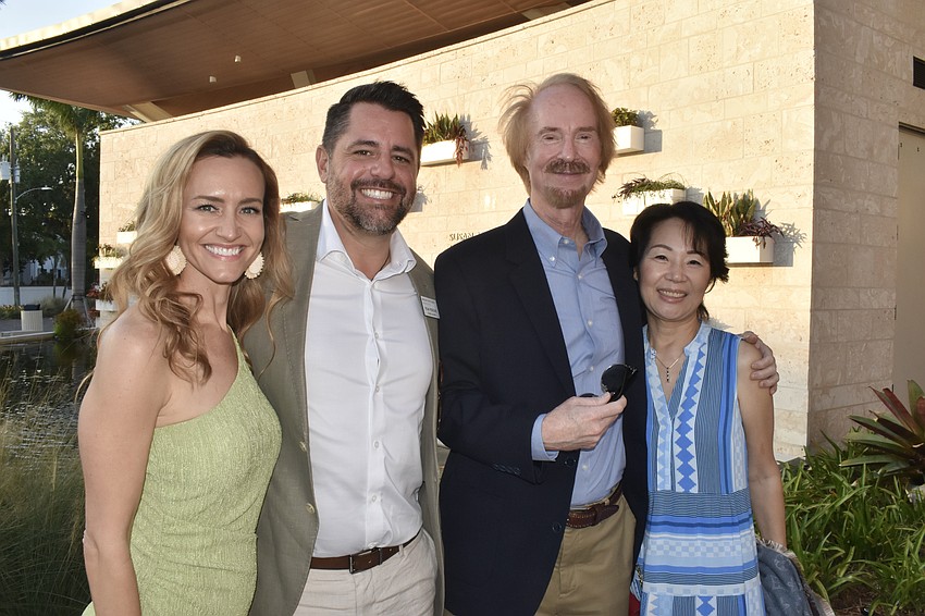 Brittany Perrone and her husband Ryan Perrone, and Don Cooper and his wife Hyun Cooper