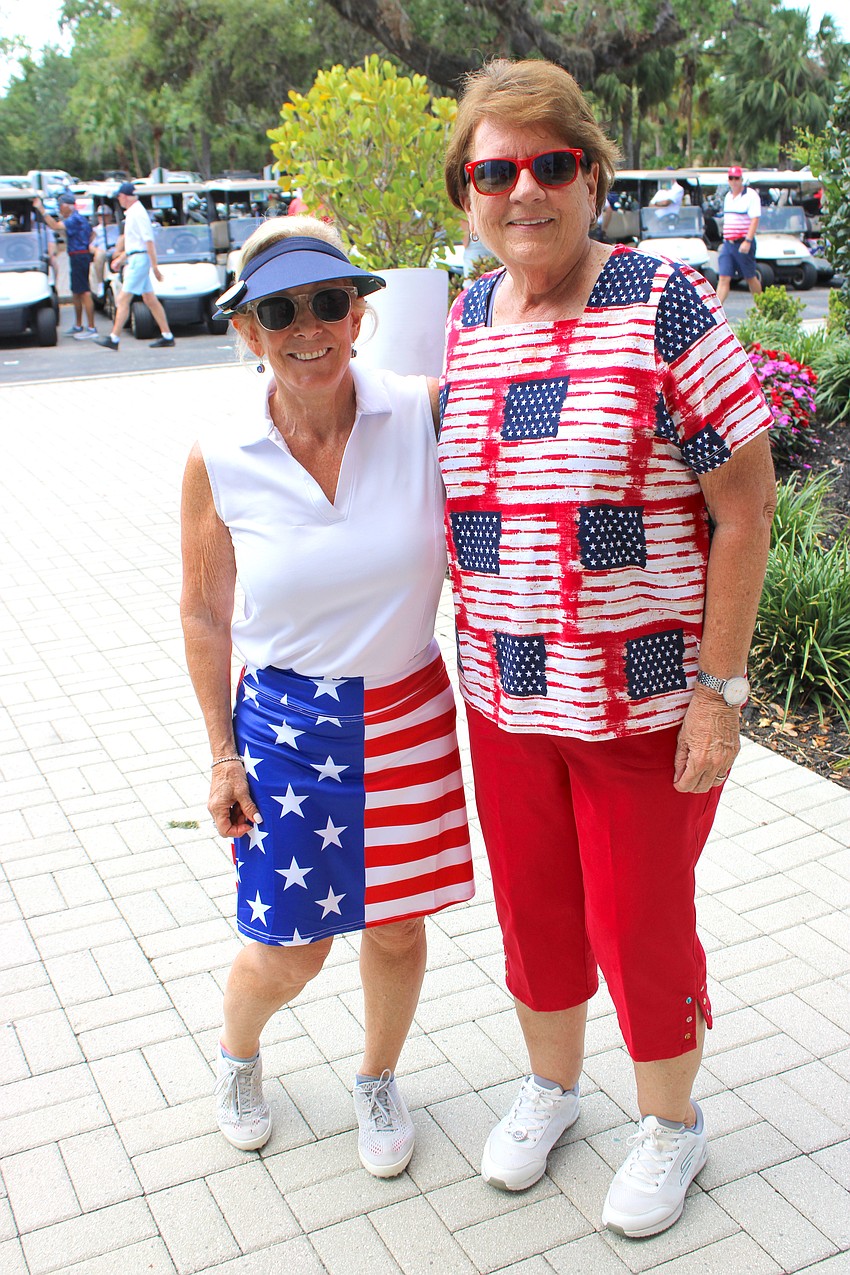Golfers Susan Popyer and Judy Diehl dressed for the occasion to support Homes for Our Troops during the Rosedale Golf Classic April 2.
