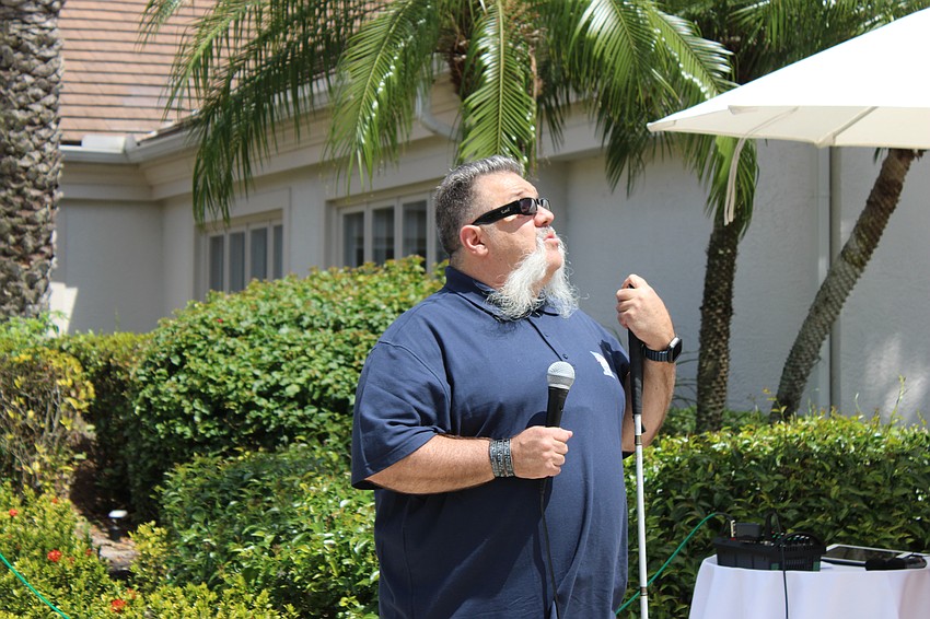Army Sgt. Aaron Cornelius addresses the crowd at the Rosedale Golf Classic on April 2.