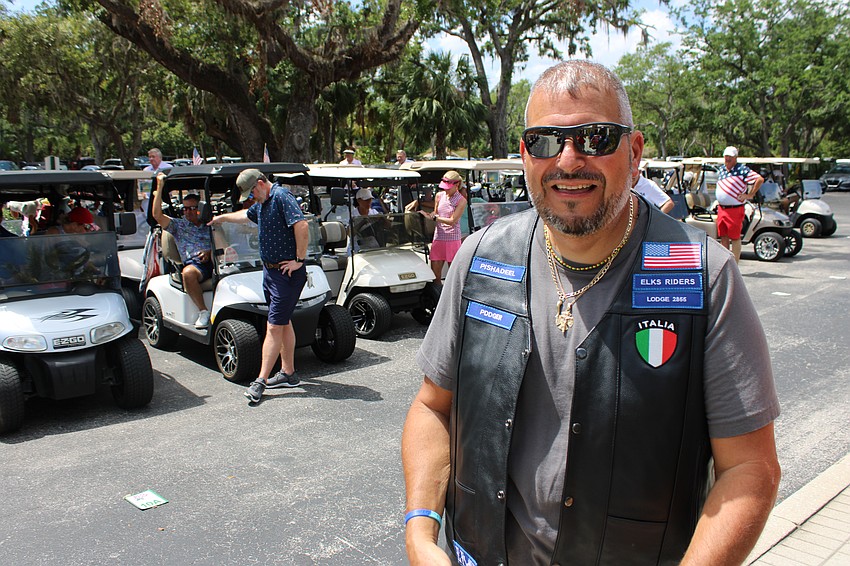 Darrin Simone represents the Elks' Riders, who participated in a brief parade on their motorcycles before the Rosedale Golf Classic to raise money for Homes for Our Troops. The Lakewood Ranch Elks have been longtime supporters of the event.