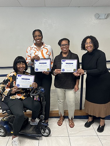 Carman Clark, Dr. Amber Veta-Ball, Laurel Jones and Healthier, Wealthier, Wiser Inc. Executive Director Belinda Davis. Courtesy photo