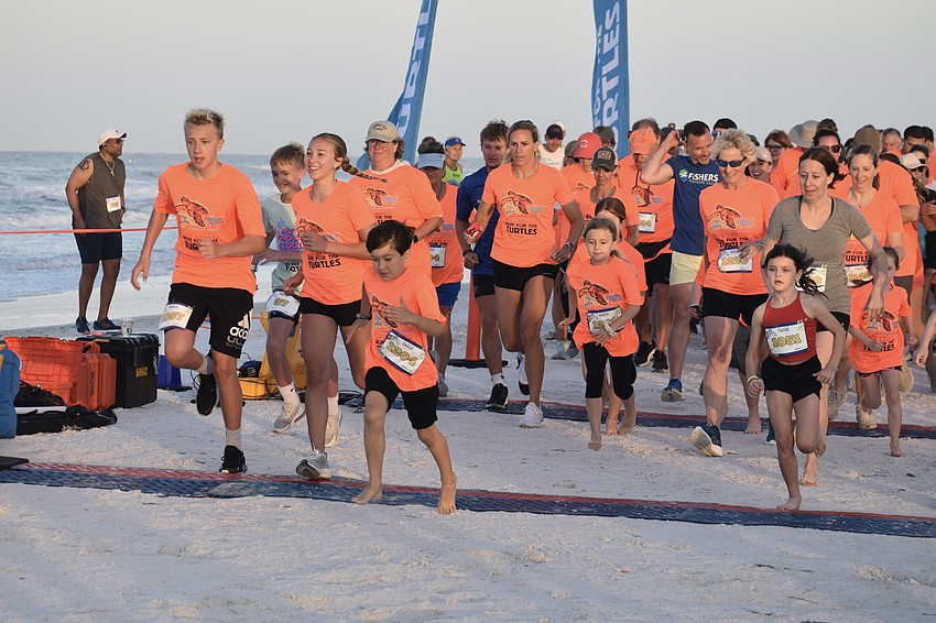 Racers begin the fun run.