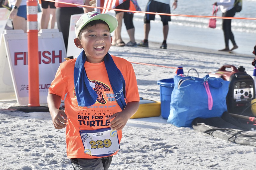 Ezra Dominguez Hernandez, 8 comes in at the finish line.