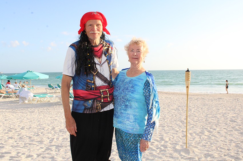 Dennis and Jody Matthier dress to the nines for the pirates and mermaids-themed beach party closing out the peak season for the Lido Key Residents Association.